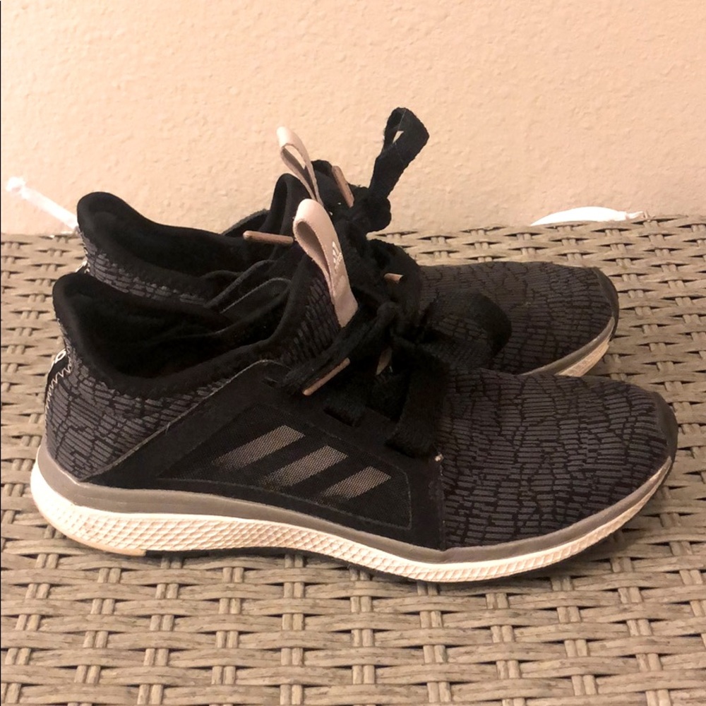 Adidas Tennis shoes. Black with light pink accent.